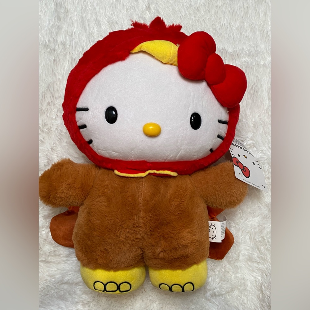Sanrio Hello Kitty Plush in Red, Brown, and Yellow